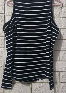 H&amp;M  Black and white striped cold-shoulder top.