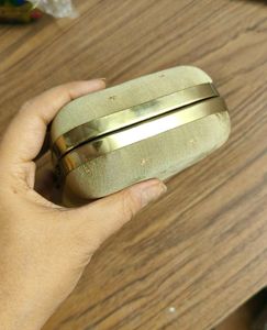 Tan Gold banarasi Clutch ( Factory reject)