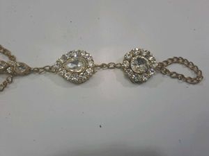 A Pair Of Dazzling Kundan style Stone Hathphool