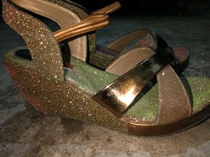 It Is A Sandal With Heels