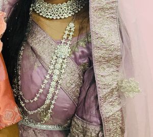 Bridal lehanga with aari work tassels 💜