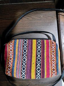 Indie print sling bag.