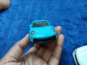 Teal Porsche Toy Car