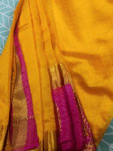 Yellow Saree With Pink Border