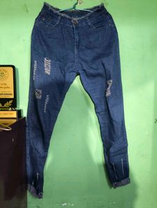 Ripped Blue Denim Jeans