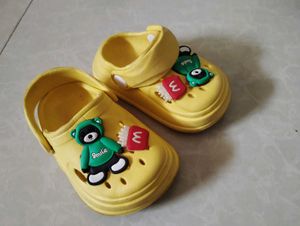 Yellow Clogs with Fun Charms