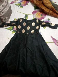 Black Dress with Gold Polka Dot Detail