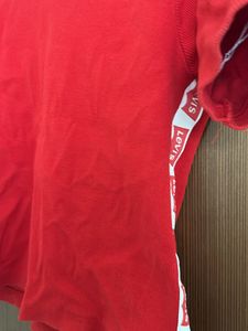 Red Top With Levis Strip At The Sides Turtle Neck