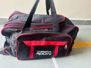 Ranjit Rocky Black & Red Duffle Bag With Wheels