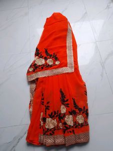 Elegant Orange Embroidered Saree