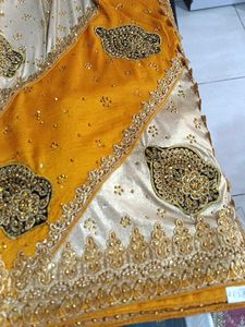 Elegant Yellow &amp; Gold Embellished Saree