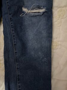Ripped Knee Denim Jeans