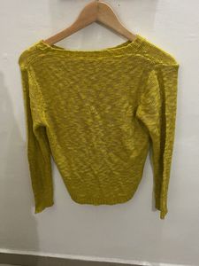 yellow sweater