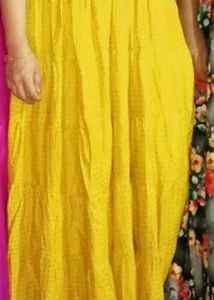 Yellow Long Skirt With Shinning Work