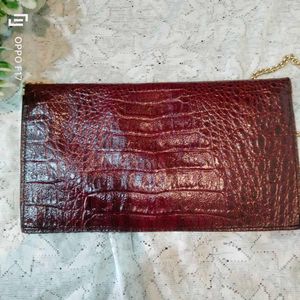 maroon vintage leather snakeprint bag