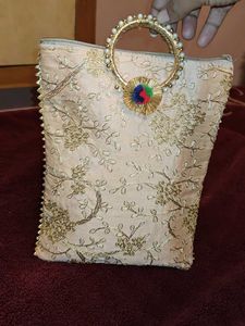 Elegant Gold Embroidered Party Wear Potli Handbag