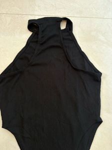 Chic Black Ribbed Bodysuit