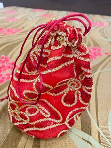 Red Potli With Sequence Work