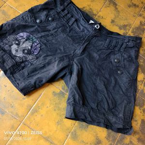 1151. Embroidered Black Denim Shorts