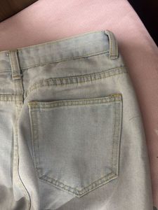 Distressed Light Wash Denim Jeans