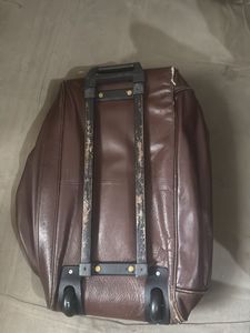 Leather Rolling Suitcase
