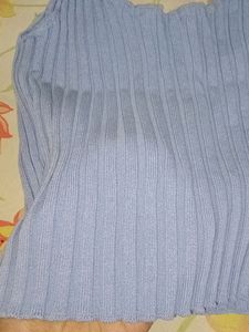 beautiful sky blue top. good condition worn only once. can style with black or blue jeans and with skirts . looks super classy.