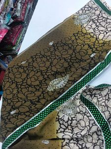 Elegant Brown Embellished Saree