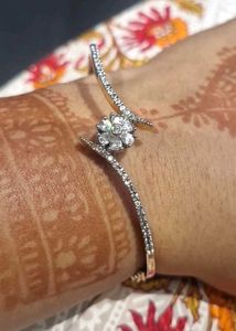 GOLD TONE AMERICAN DIAMOND KADA BRACELET