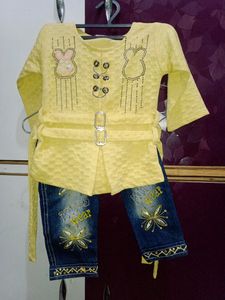 Denim Jeans With Yellow Top.