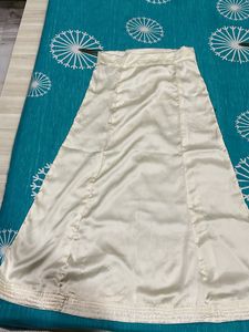 Underskirt Of Saree Or Peticoat Cream Shiny Colour