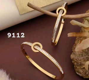 Gold Tone Flower Bangle Set