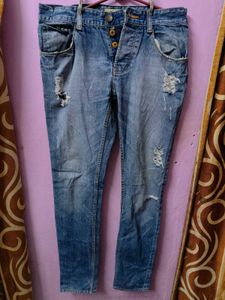 Ripped Blue Denim Jeans