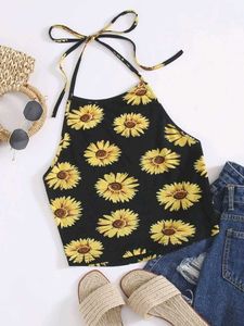 halter neck crop top featuring a vibrant sunflower