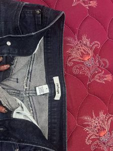 Ripped Dark Blue Jeans