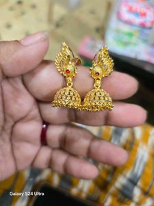 golden peacock jhumkas