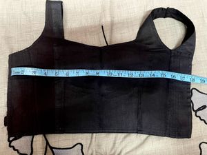 backless black blouse