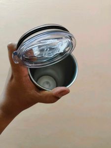 Black Tumbler and Lid With Thermal control.