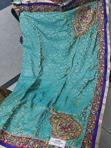 Teal And Red Embellished Saree