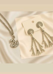 Combo Of Earrings And Swan Pendant