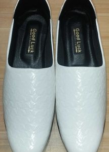 White Nagra slip-on shoes