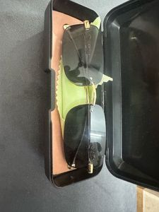 Rimless Sunglasses with Gold Jaguar Detail
