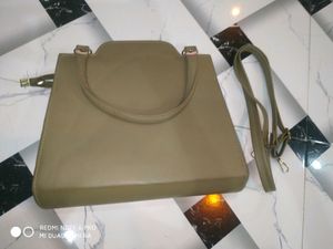 partywear stylish olive green hand bag with belt