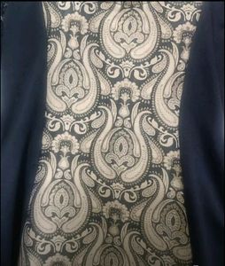 Black gown with cream colour combination. Ideal for parties marriage functions. Have net half sleeves .Stuff is good