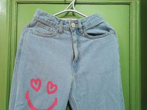 Ripped Jeans with Graffiti