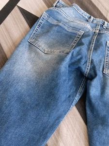 Ripped Blue Denim Jeans