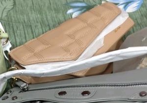 Iykyk Asymmetric Stich Textured Sling Bag