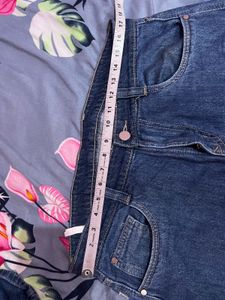 Ripped Blue Denim Jeans