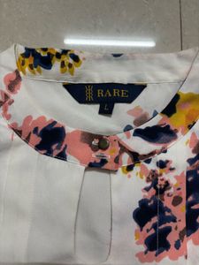 “Rare” Floral Prints Top