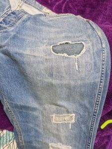 Distressed Denim Jeans