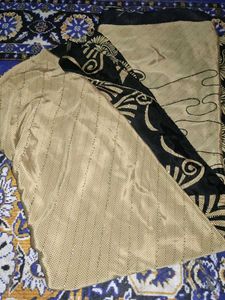 crape gold black saree